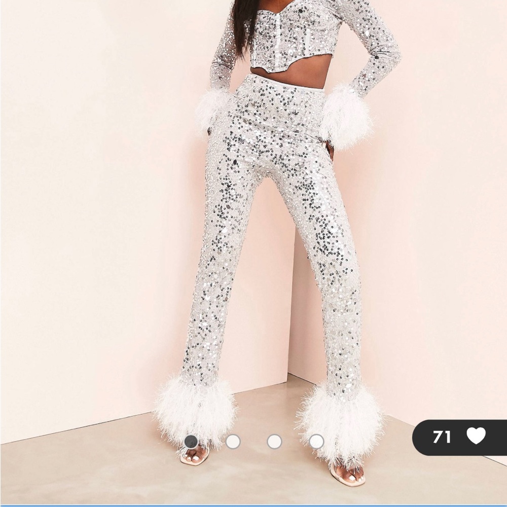 Sequin pants with feather detail.  size 14.